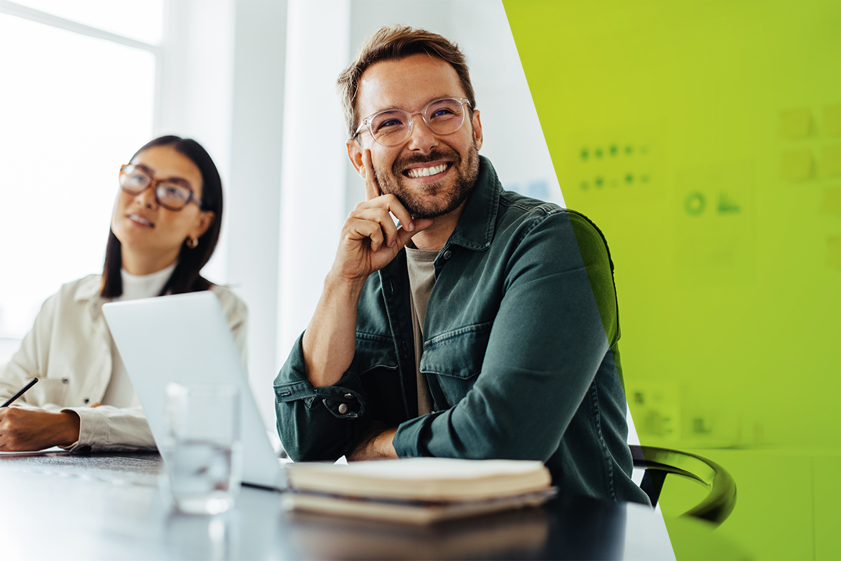 Man and woman in a meeting with a laptop